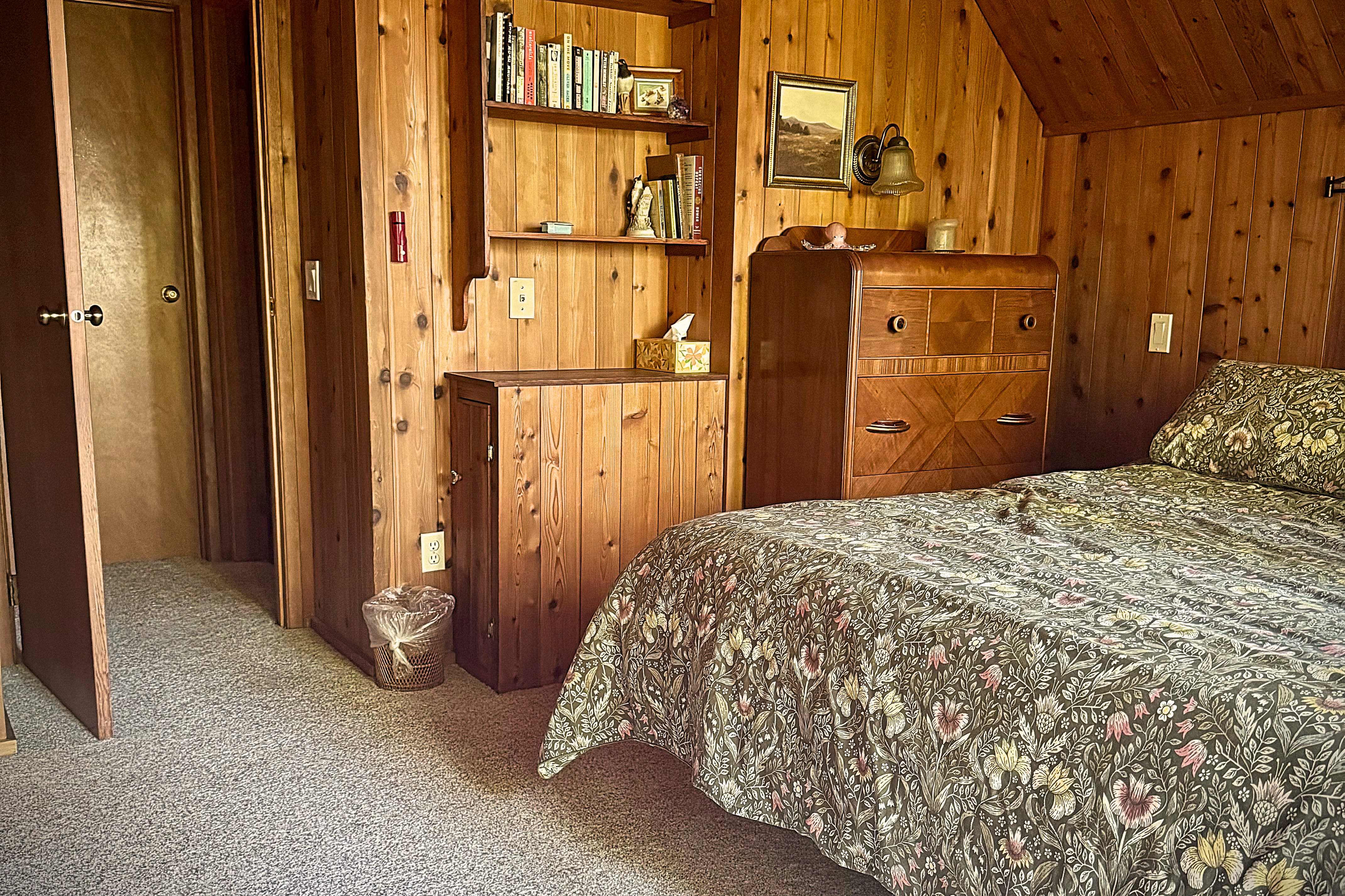 The upstairs king bedroom and its vaulted cedar ceiling.